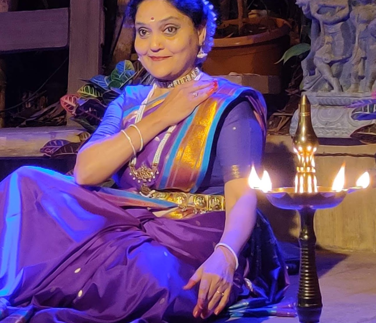 Smita Mahajan in Bharatanatyam attire with traditional oil lamp
