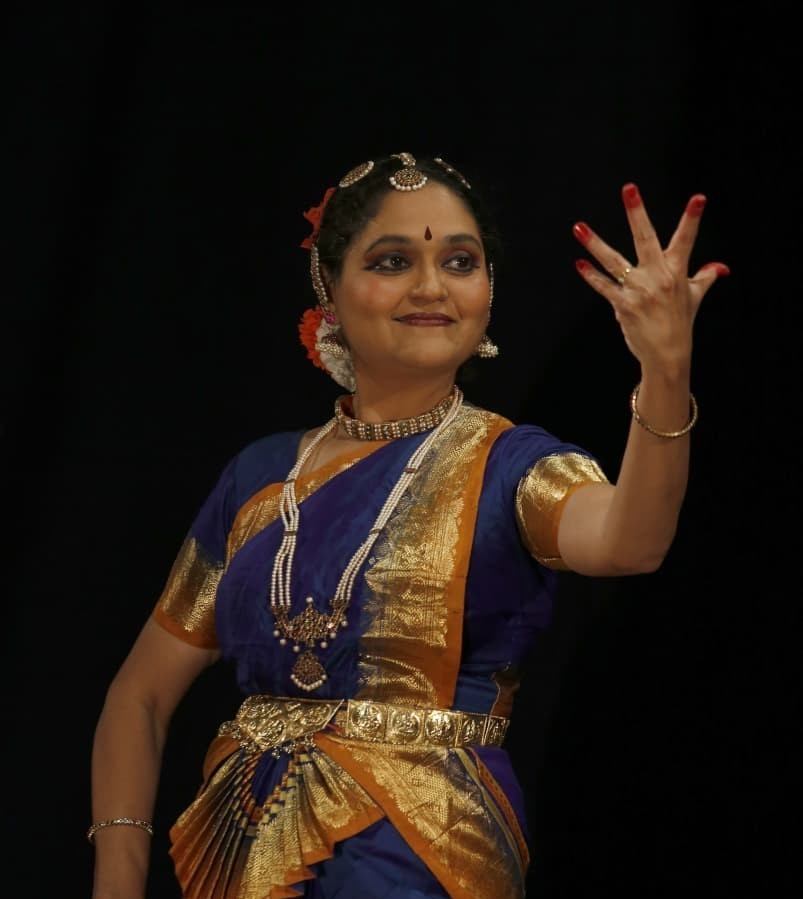 Smita Mahajan in Bharatanatyam attire with traditional oil lamp